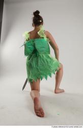 KATERINA KNNELING POSE WITH SWORD